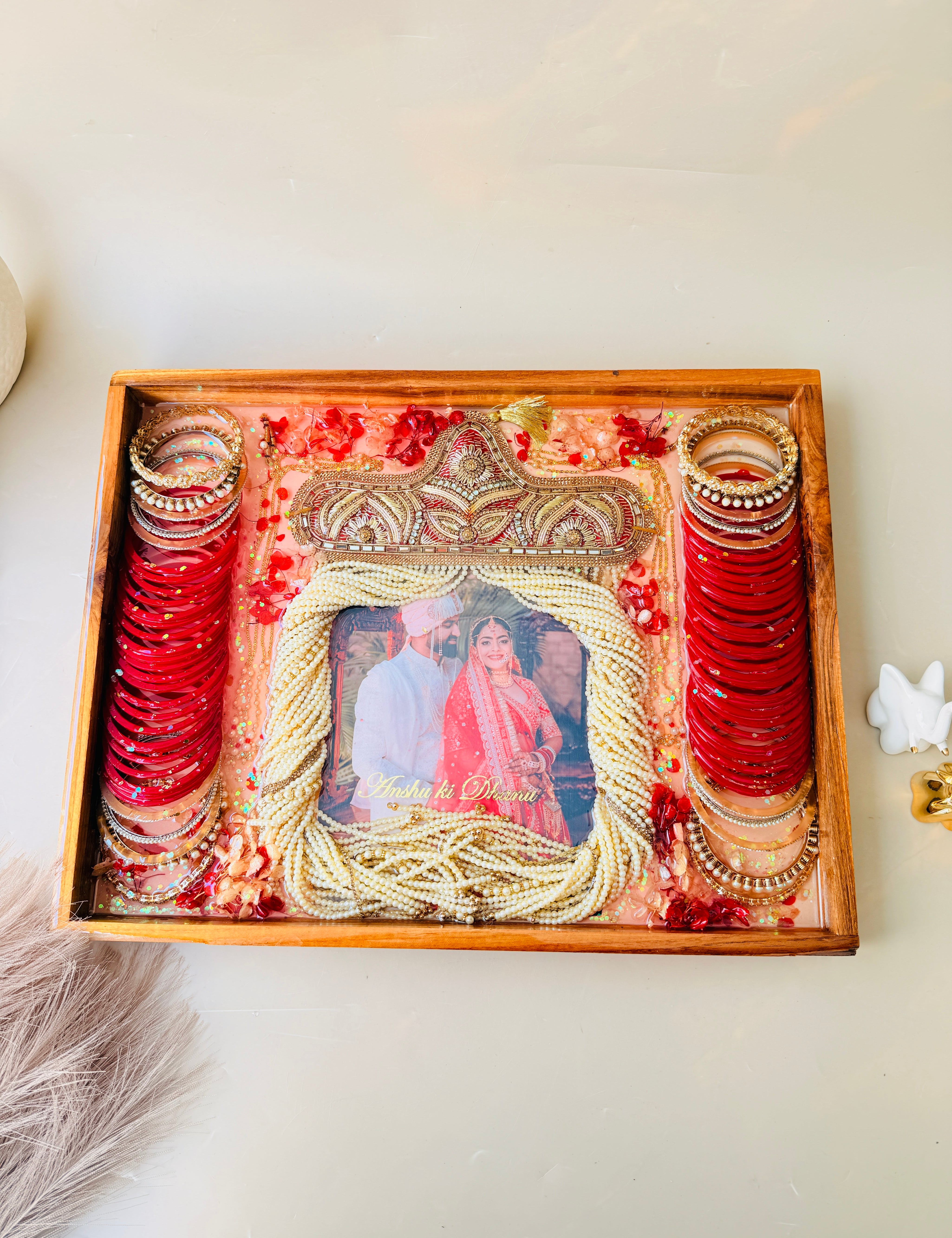 Wedding varmala preserved in resin photo frame