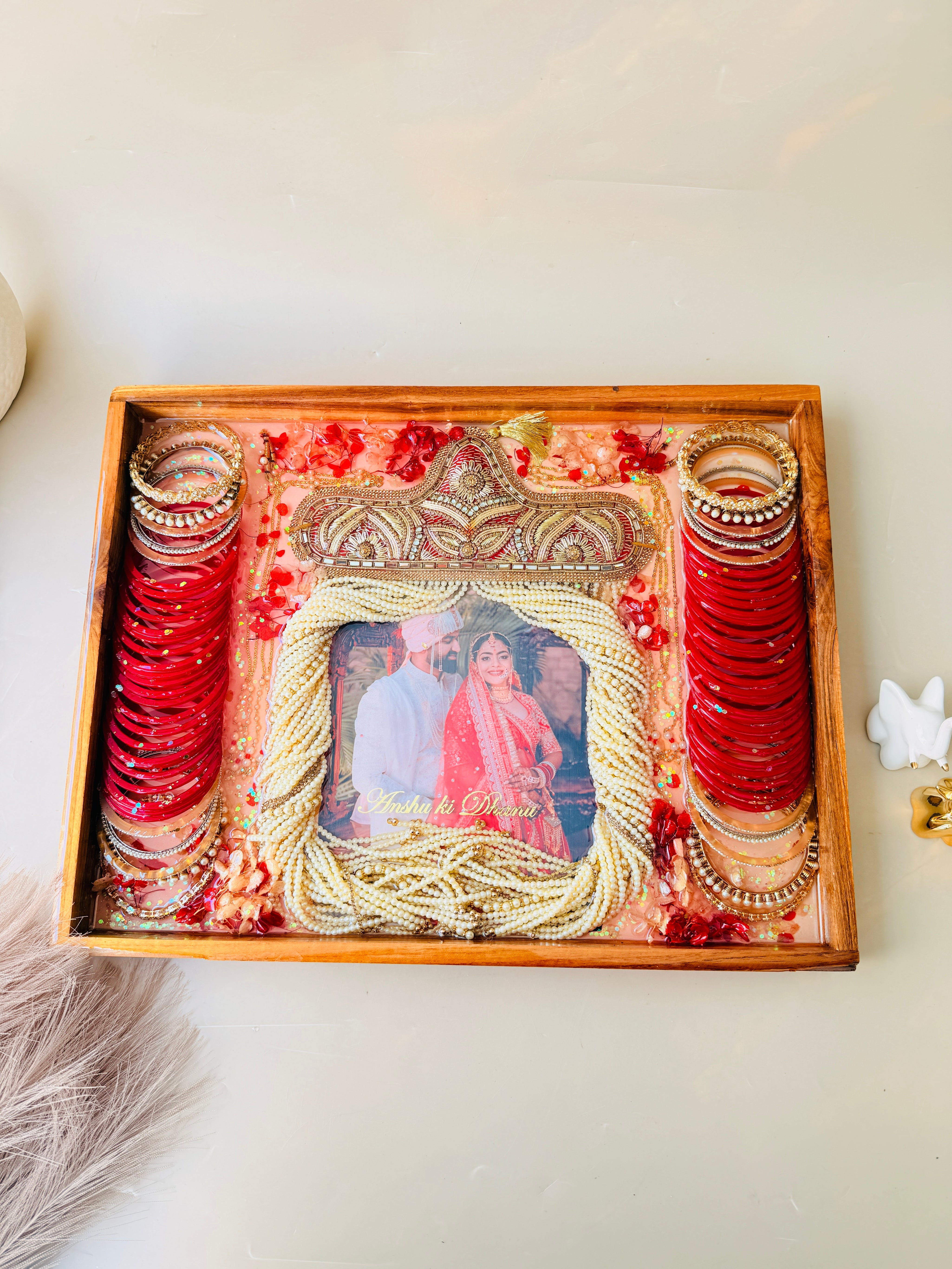 Wedding varmala preserved in resin photo frame