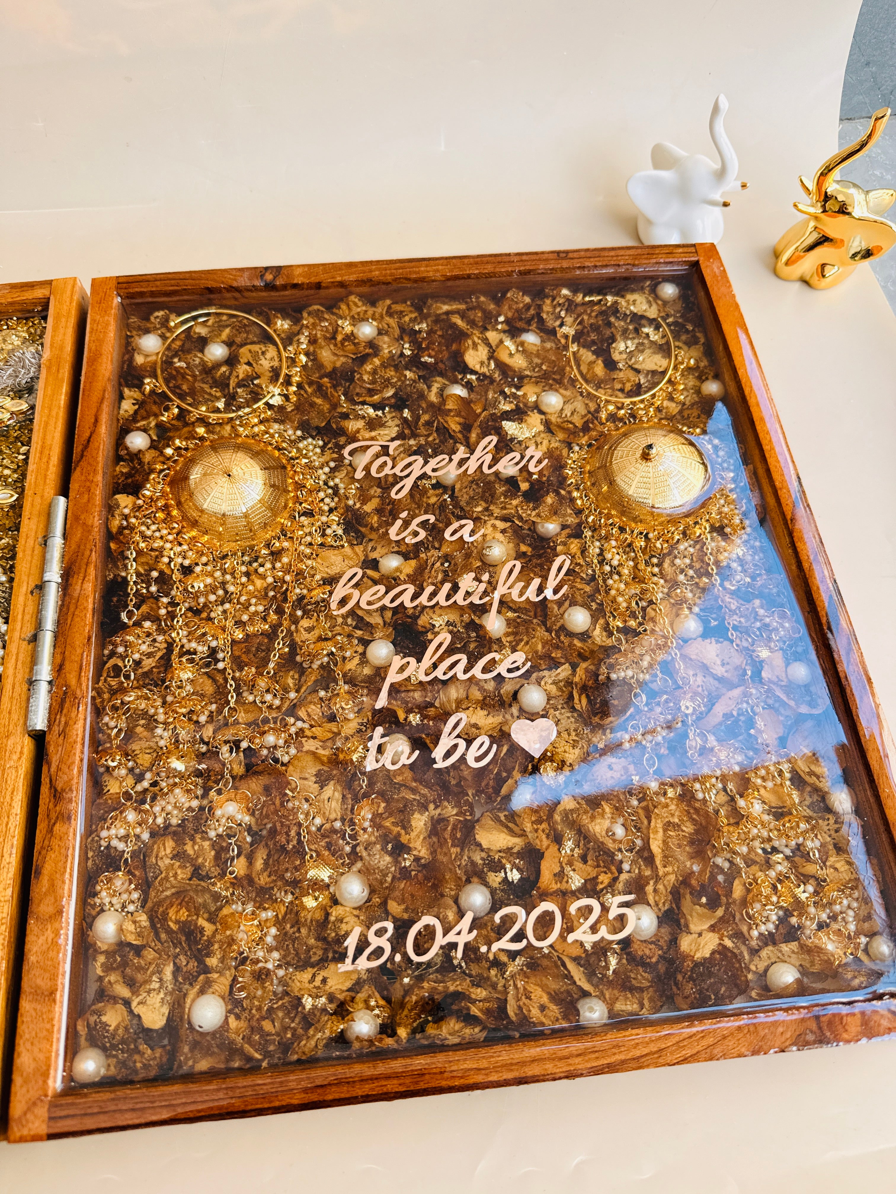 Wedding varmala preserved in resin photo frame